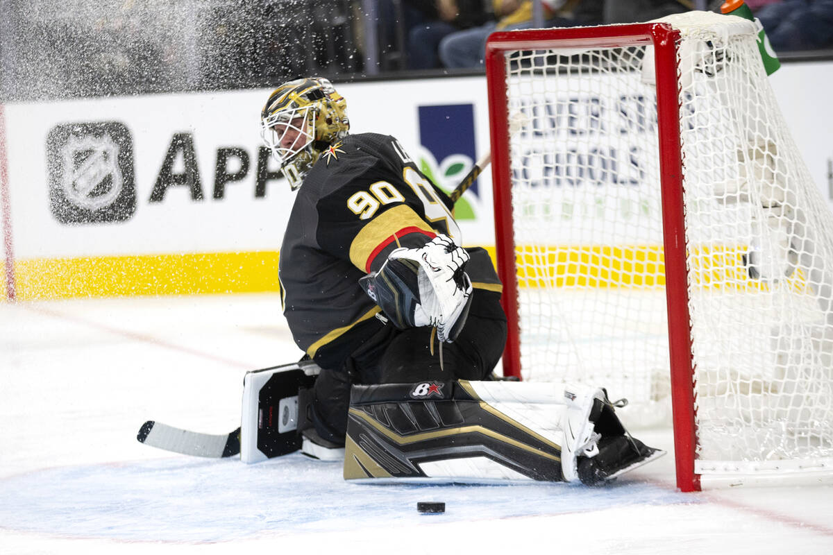 Golden Knights goaltender Robin Lehner (90) saves a shot on goal by the Kraken in the second pe ...