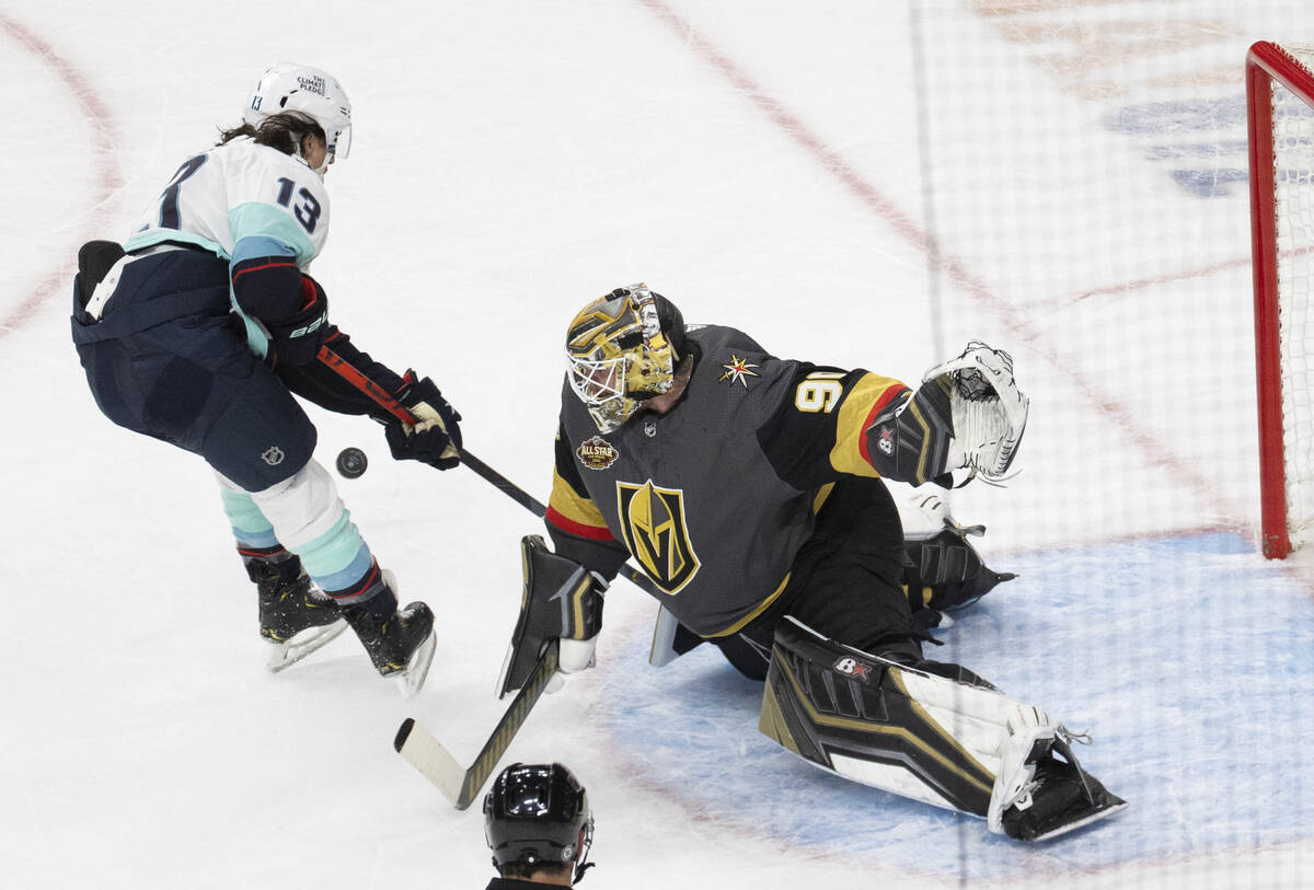 Vegas Golden Knights goaltender Robin Lehner (90) makes a save against Seattle Kraken left wing ...