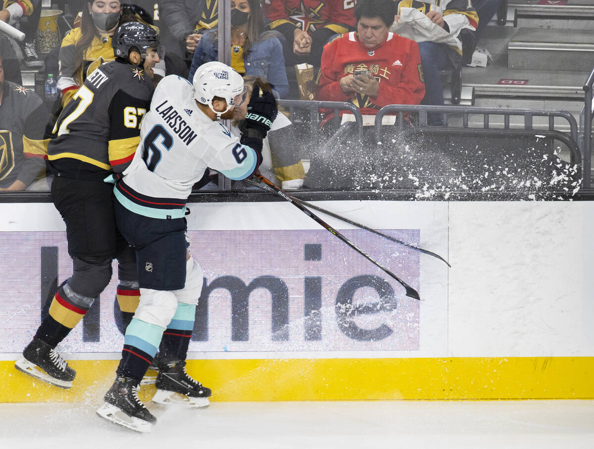 Vegas Golden Knights left wing Max Pacioretty (67) collides with Seattle Kraken defenseman Adam ...