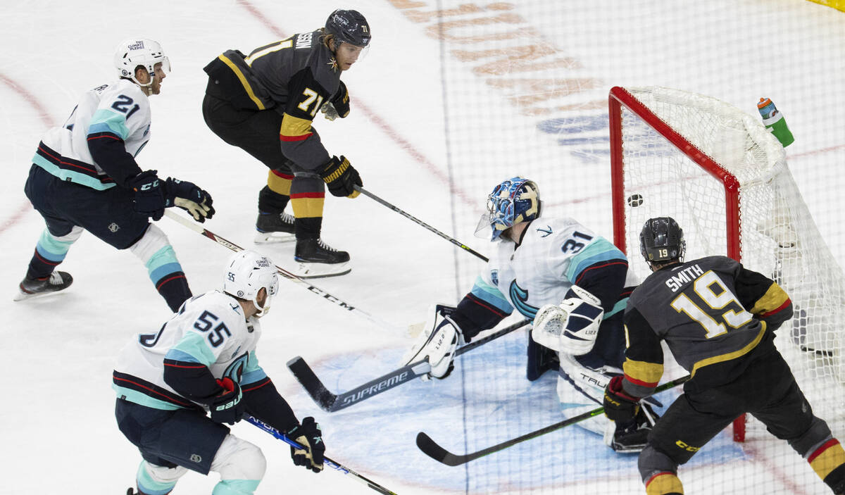 Seattle Kraken goaltender Philipp Grubauer (31) makes a save against Vegas Golden Knights cente ...