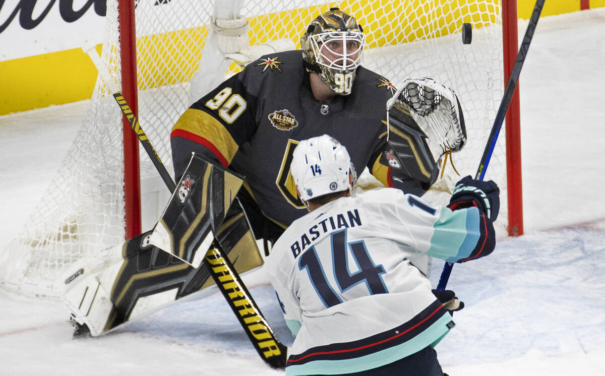 Vegas Golden Knights goaltender Robin Lehner (90) makes a save against Seattle Kraken right win ...