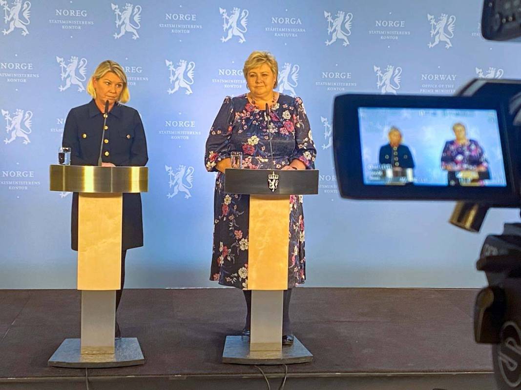 Norway's Acting Prime Minister Erna Solberg, right, and Minister of Justice Monica Mæland, ...