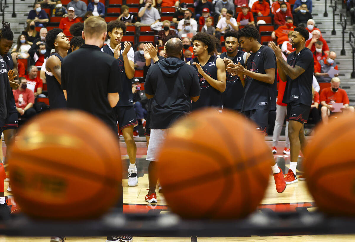 UNLV players warm up during an open basketball practice and fundraiser for former player Robert ...