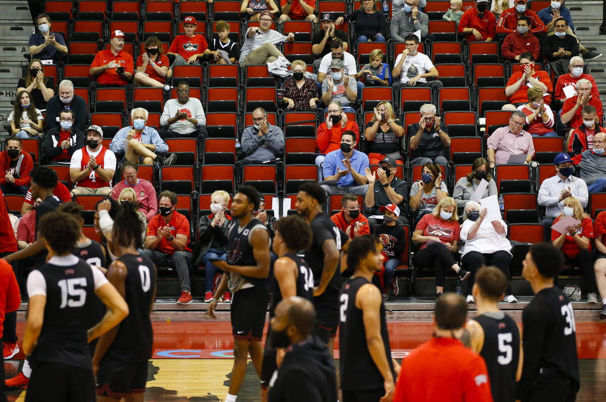 UNLV fans cheer during an open basketball practice and fundraiser for former player Robert Smit ...