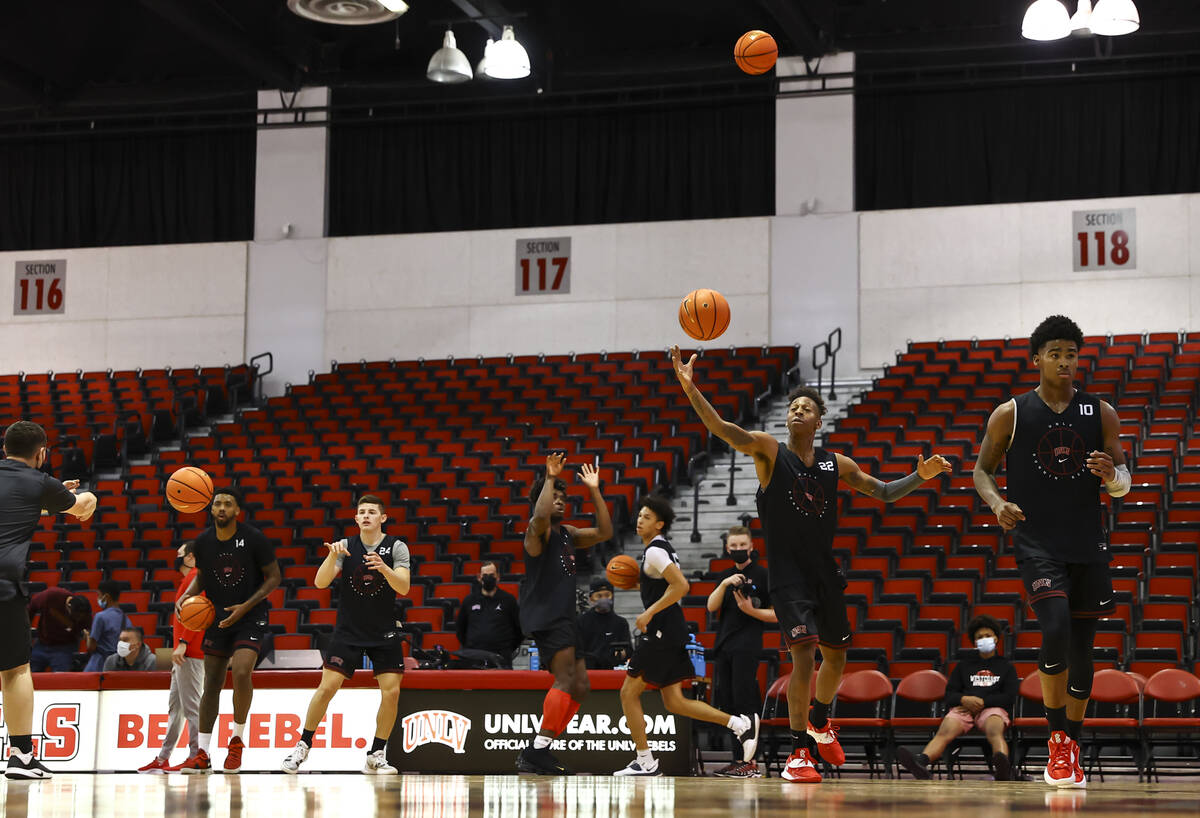 UNLV players participate in drills during an open basketball practice and fundraiser for former ...
