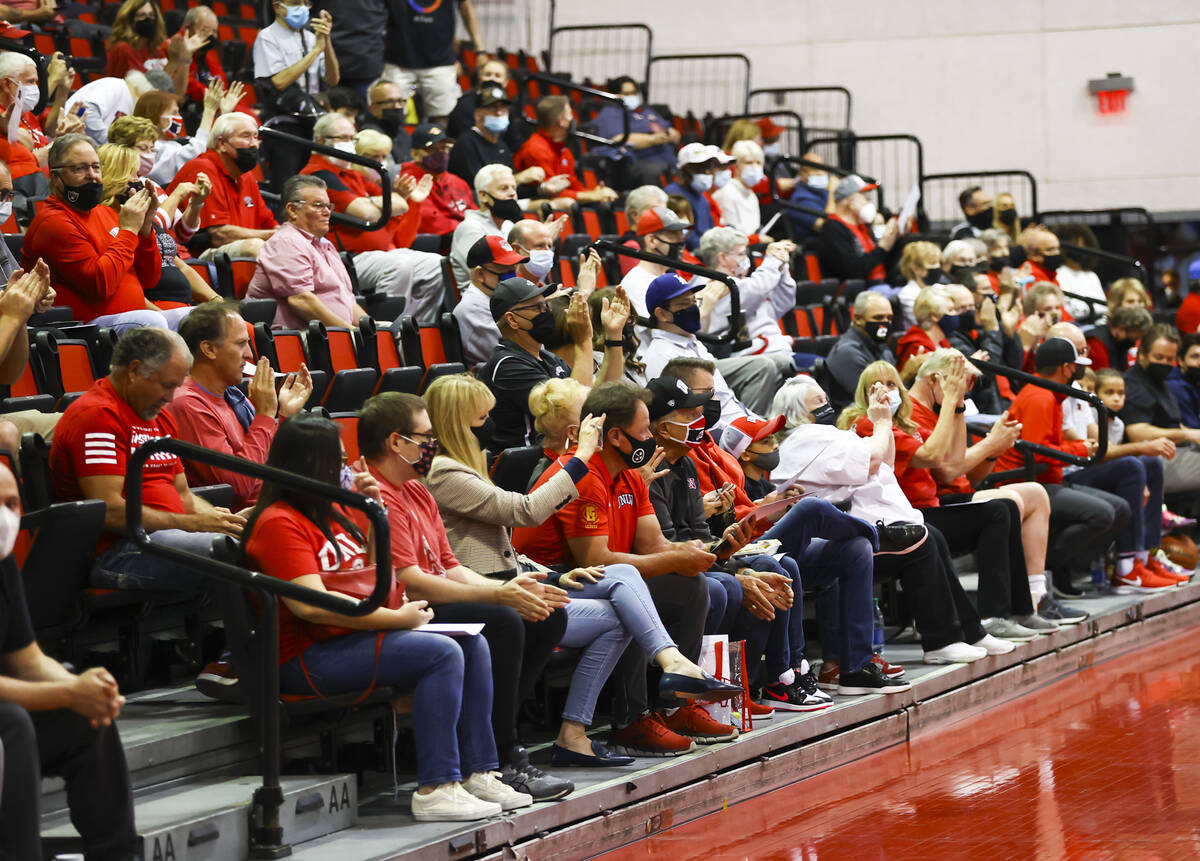 UNLV fans cheer during an open basketball practice and fundraiser for former player Robert Smit ...