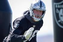 Raiders defensive end Maxx Crosby (98) runs through a drill during a practice session at the Ra ...