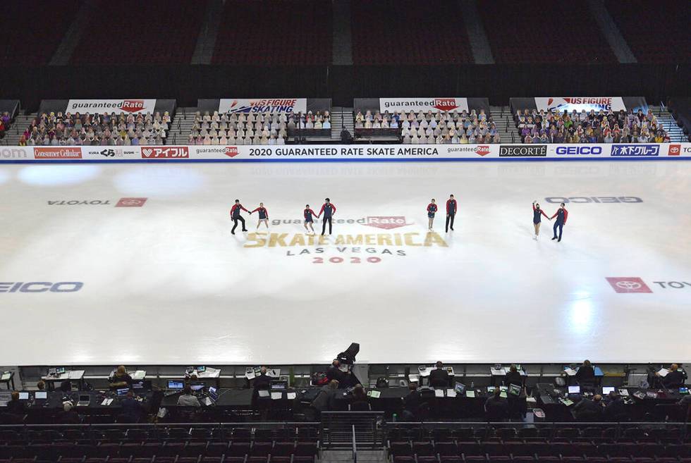 Skaters are introduced before the ice dance free dance program in the International Skating Uni ...