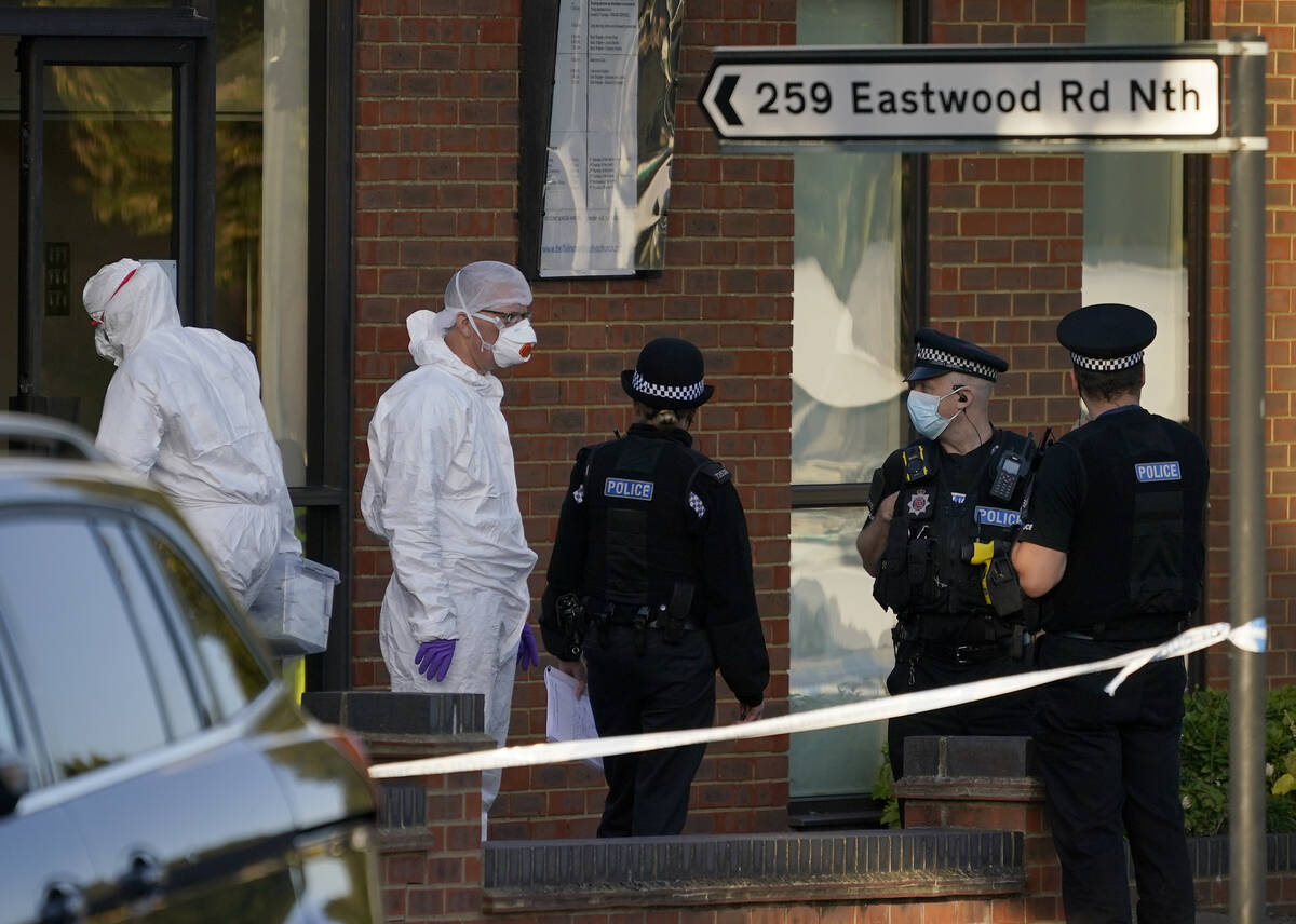 Police officers talk at the scene outside the Belfairs Methodist Church in Eastwood Road North, ...