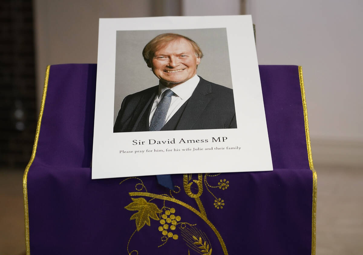 An image of murdered British Conservative lawmaker David Amess is displayed near the altar in S ...