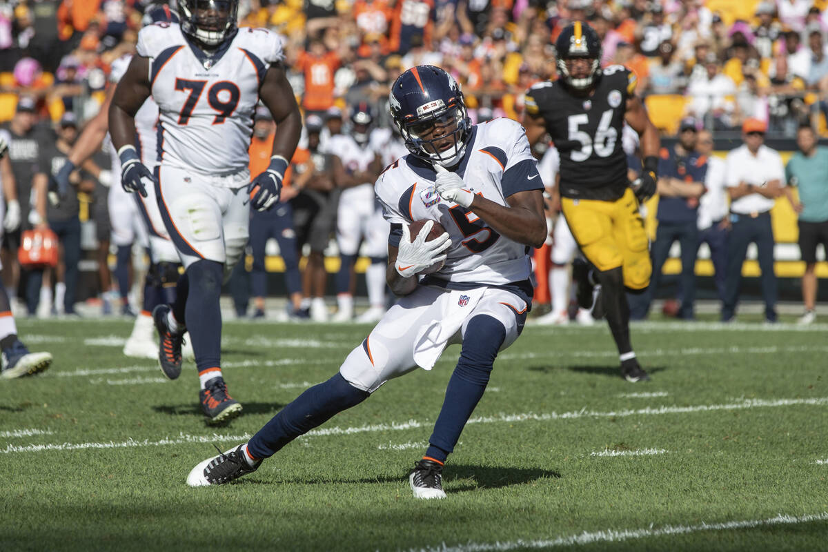 Denver Broncos quarterback Teddy Bridgewater (5) rushes against the Pittsburgh Steelers during ...