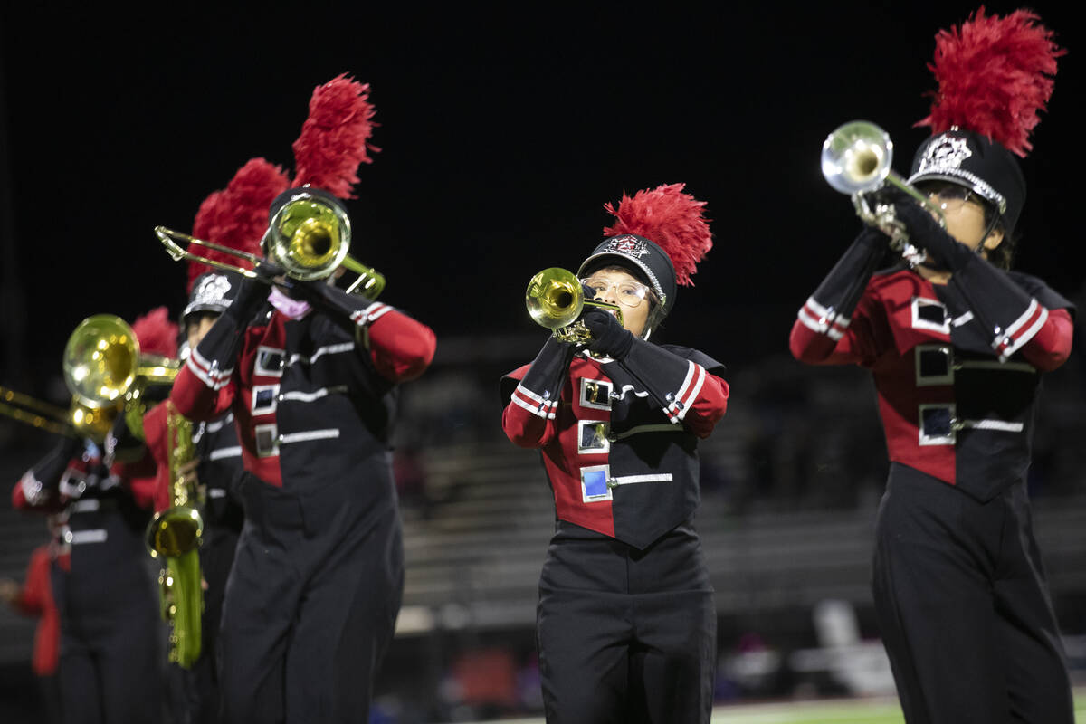 The Las Vegas High School marching band performs during halftime of a high school football game ...