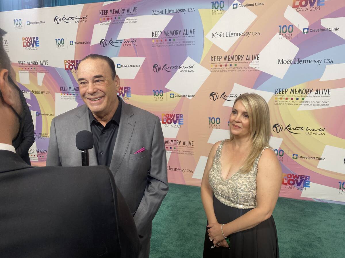 Jon and Nicole Taffer are shown on the red carpet of the 25th Keep Memory Alive Power of Love g ...