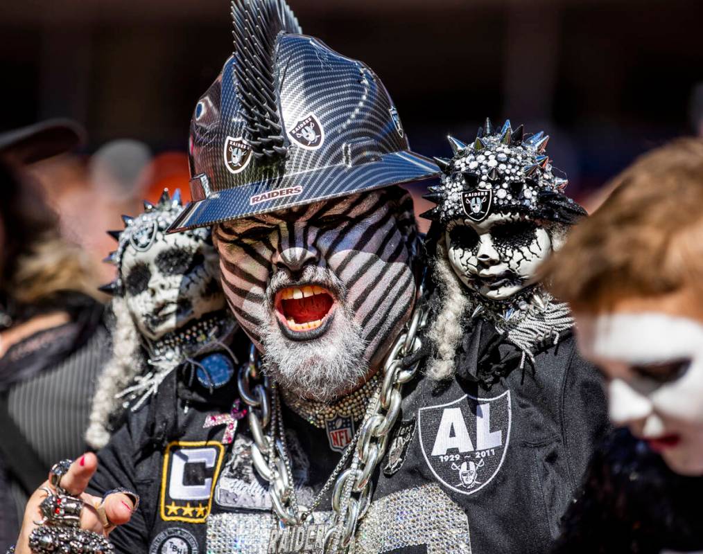 A RaidersÕ fan yells for the team versus the Denver Broncos during the first half of an NF ...