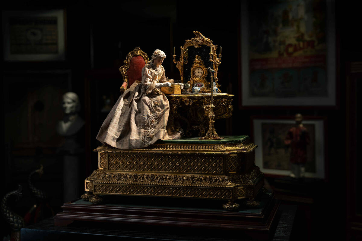 An "automata" created by Jean-Eugène Robert-Houdin, featuring a figurine that moves a crank w ...