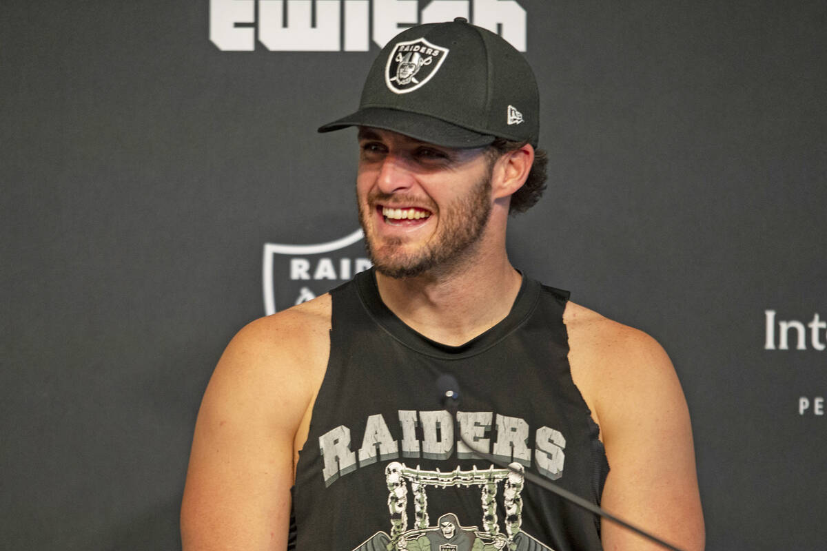 Raiders quarterback Derek Carr laughs during a news conference at the Raiders Headquarters at t ...