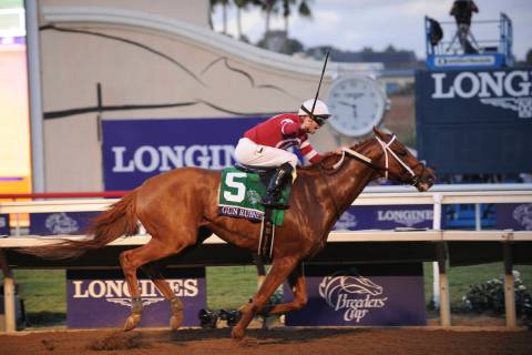 IMAGE DISTRIBUTED FOR LONGINES - Jockey Florent Geroux and Gun Runner cross the finish line to ...