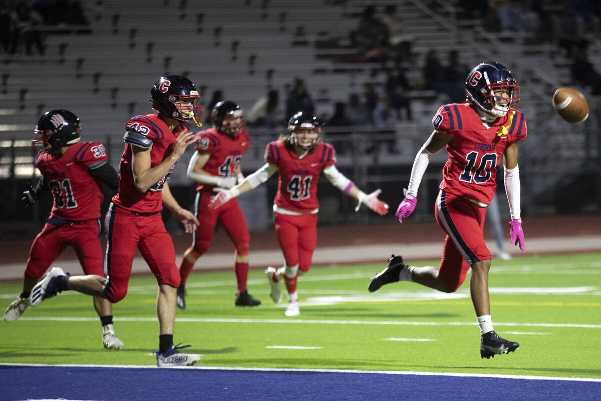 Coronado's Jaylen Garrison (10) celebrates a touchdown during the second half of a high school ...