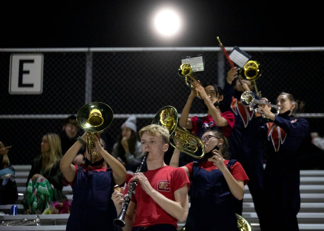 Coronado's marching band plays from the stands during the second half of a high school football ...