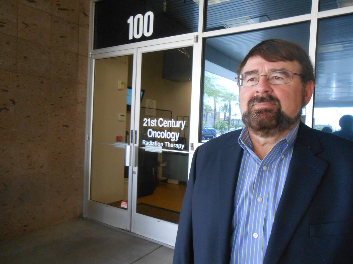 John Romas of Summerlin, father of "Sexxy" creator Jennifer Romas, stands outside the offices o ...