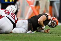 Cleveland Browns quarterback Baker Mayfield (6) gets injured on a hit by Arizona Cardinals defe ...