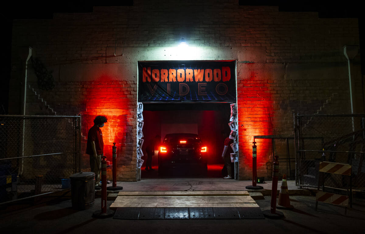 Attendees arrive in their vehicle for the Horrorwood Video drive-in at the Majestic Repertory T ...
