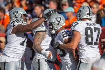 Raiders guard John Simpson (76), Raiders center Andre James (68) and Raiders tight end Foster M ...