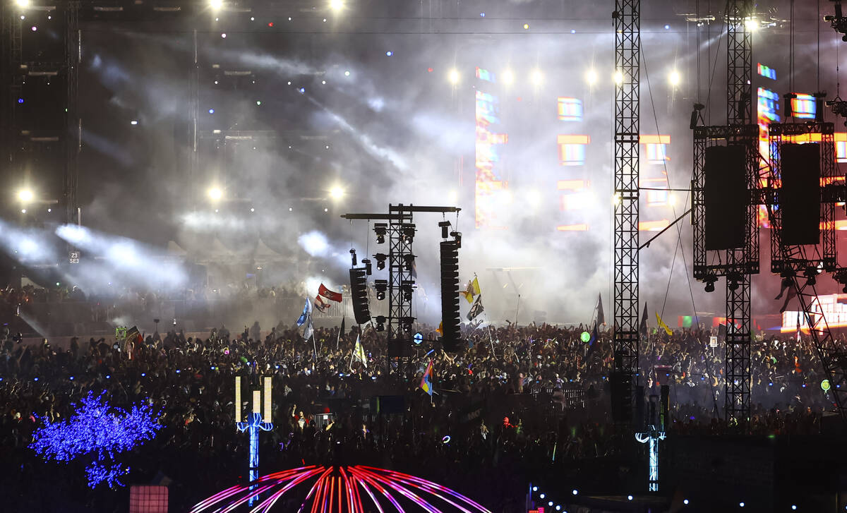 Lights shine on the crowd at the Circuit Grounds stage during the second day of the Electric Da ...