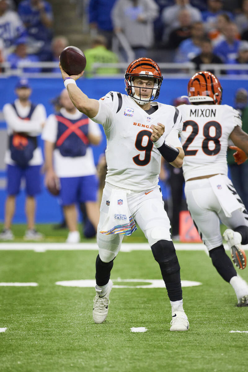 Cincinnati Bengals quarterback Joe Burrow (9) passes against the Detroit Lions during an NFL fo ...