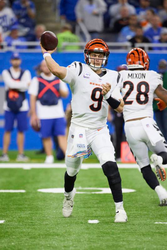 Cincinnati Bengals quarterback Joe Burrow (9) passes against the Detroit Lions during an NFL fo ...