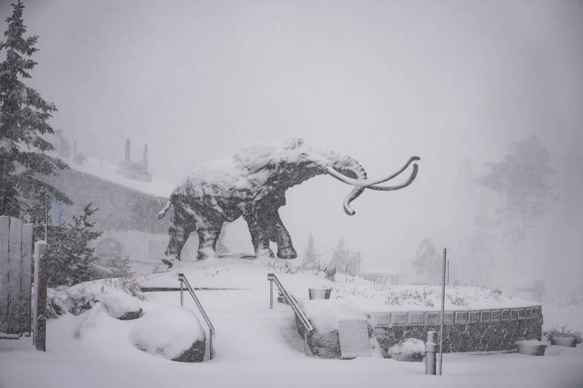 In this photo provided by Mammoth Mountain Ski Area, snow falls on Mammoth Mountain, Monday, Oc ...