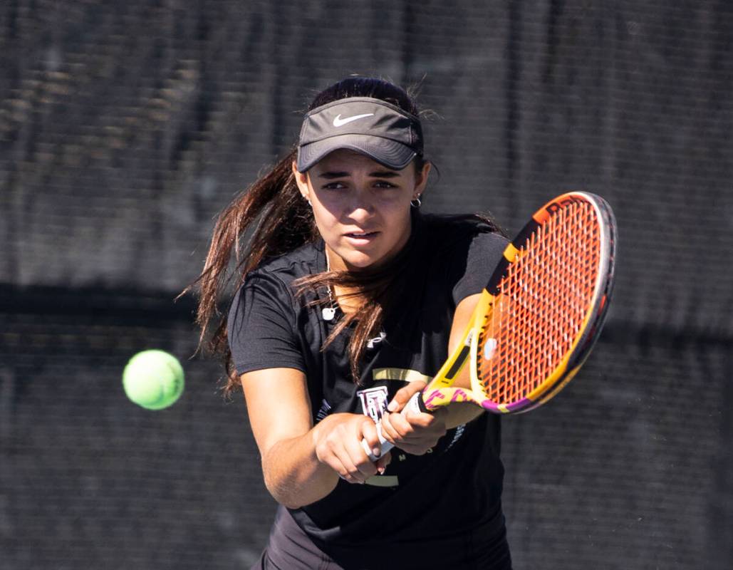 Faith LutheranÕs Van Houweling returns the ball during Class 5A team championship tennis m ...