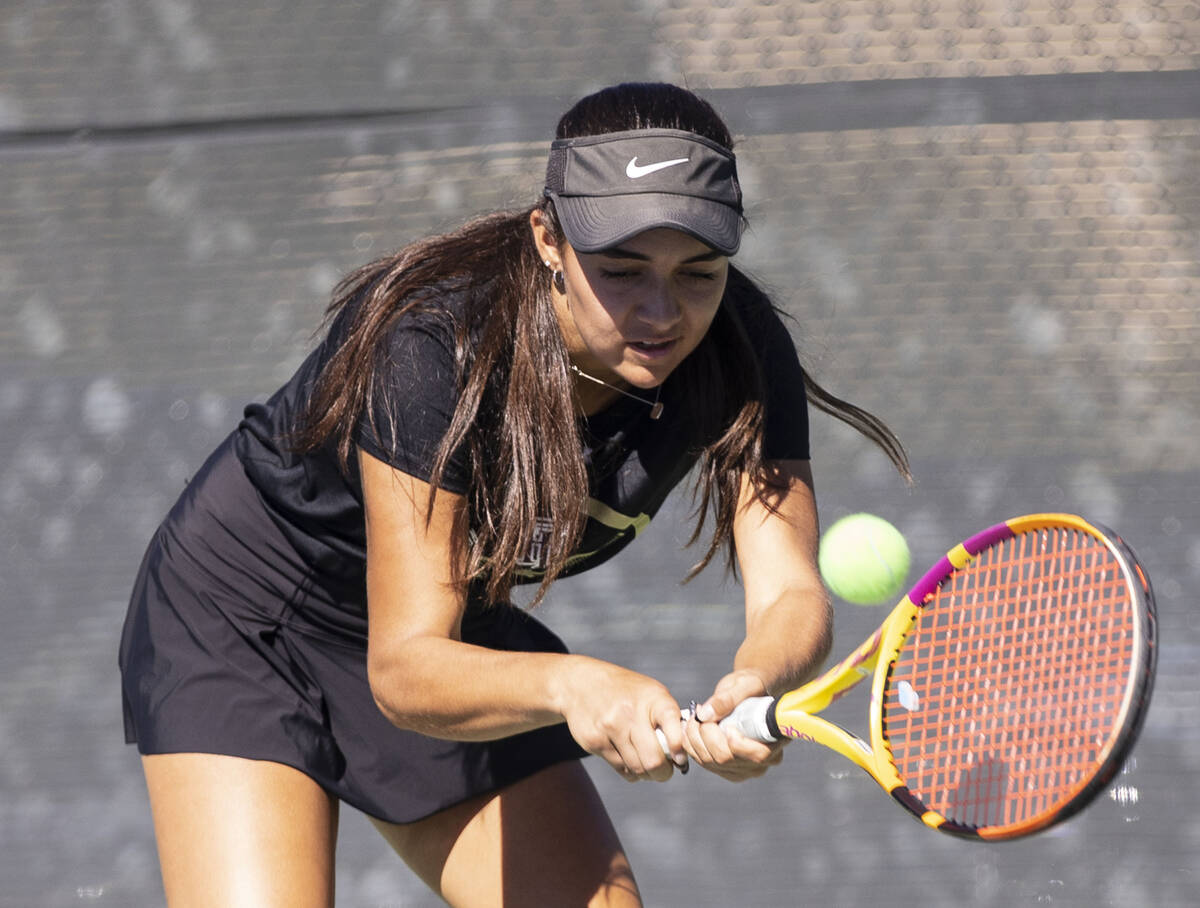 Faith LutheranÕs Van Houweling returns the ball during Class 5A team championship tennis m ...