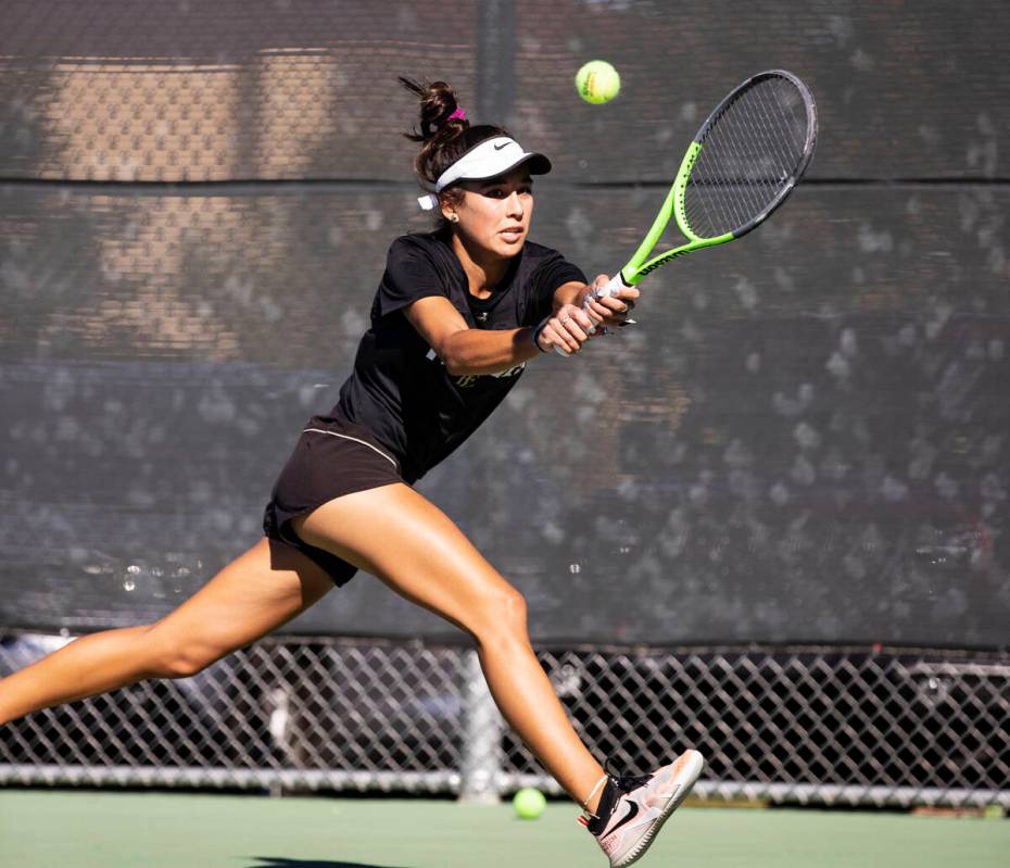 Faith Lutheran’s Taylor Nelson returns the ball against Palo High’s Venus Tang du ...