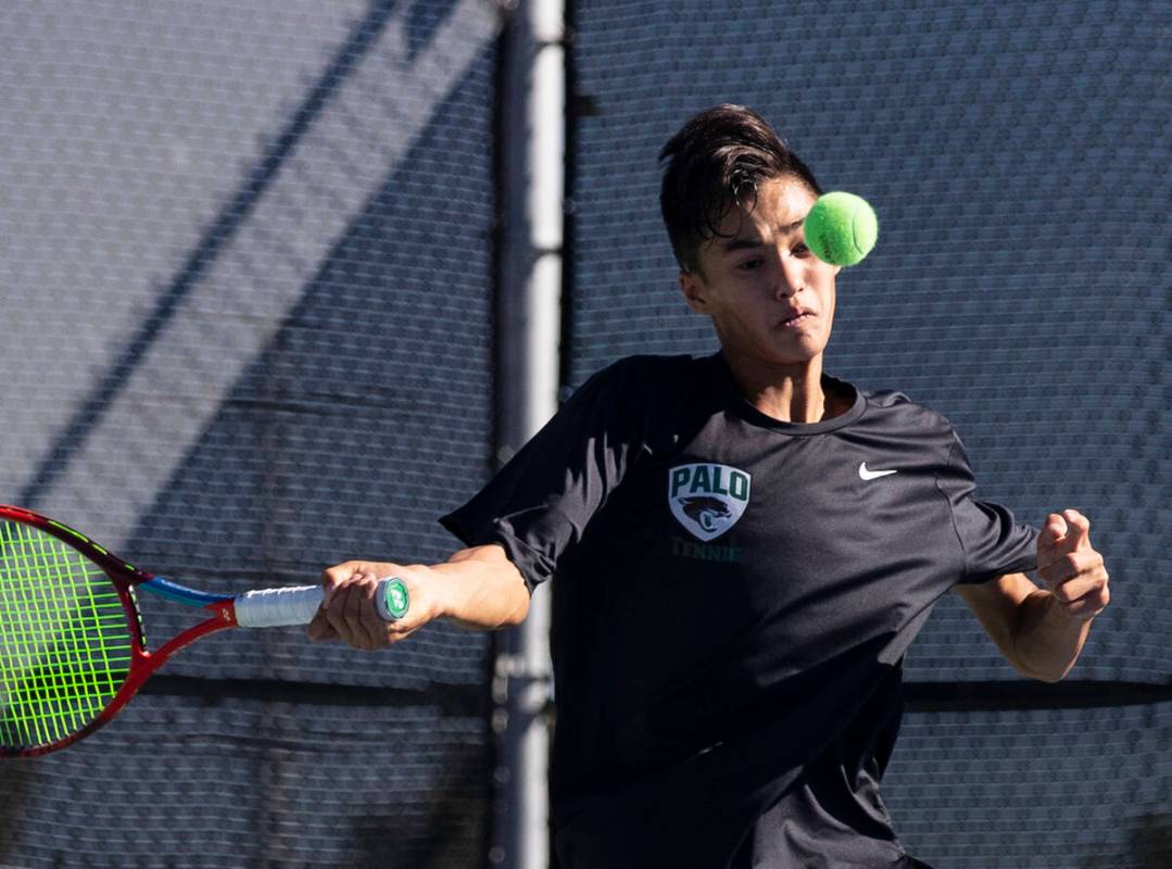 Palo High’s Jonas Santos returns the ball against Faith Lutheran’s Nolan Dubay du ...