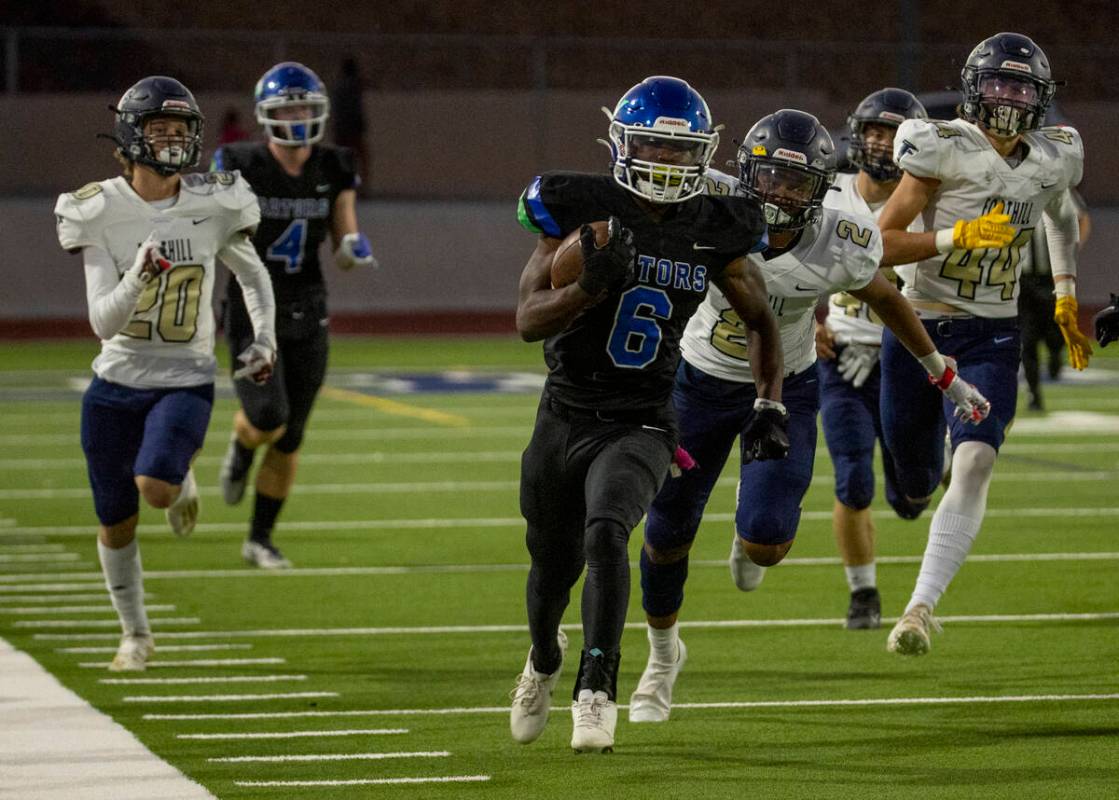 Green Valley running back Jaylen Mcknight (6) runs past Foothill defenders on a 90 yard touchdo ...