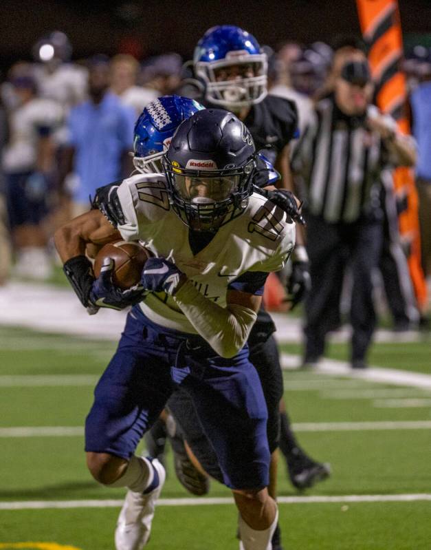 Foothill wide receiver Michael Gazzana (17) heads for the end zone over Green Valley during the ...