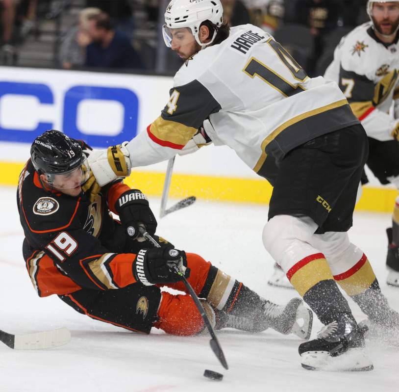 Vegas Golden Knights defenseman Nicolas Hague (14) takes down Anaheim Ducks right wing Troy Ter ...