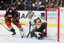 Vegas Golden Knights goaltender Robin Lehner (90) defends against Anaheim Ducks right wing Jako ...