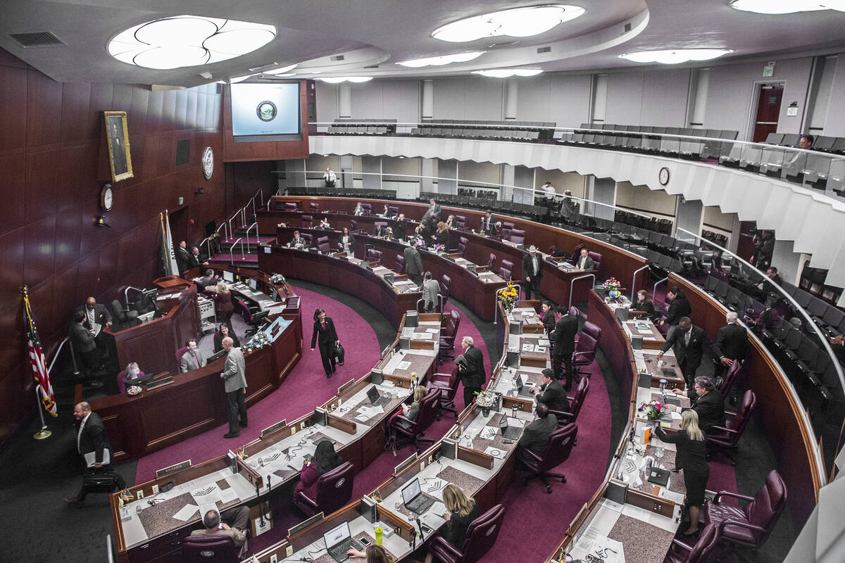 Members of the assembly file out of chambers. (Benjamin Hager/Las Vegas Review-Journal) @benjam ...