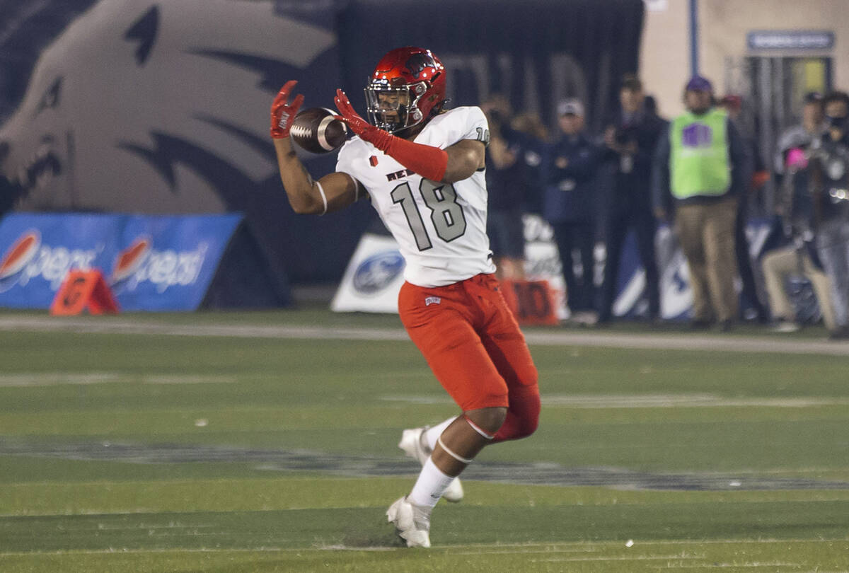 UNLV tight end Shaun Grayson reaches for a pass during the first half of the team's NCAA colleg ...