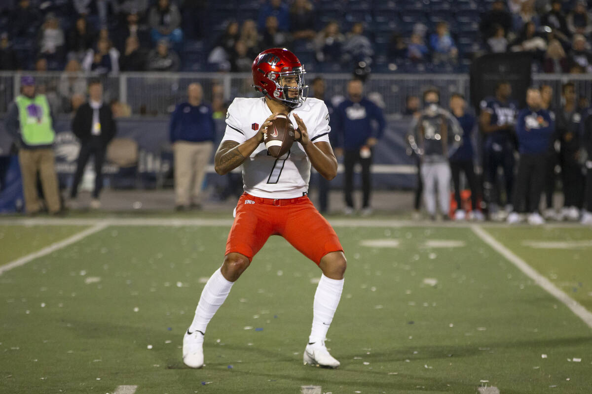 UNLV quarterback Cameron Friel (7) looks to throw against Nevada in the second half of an NCAA ...