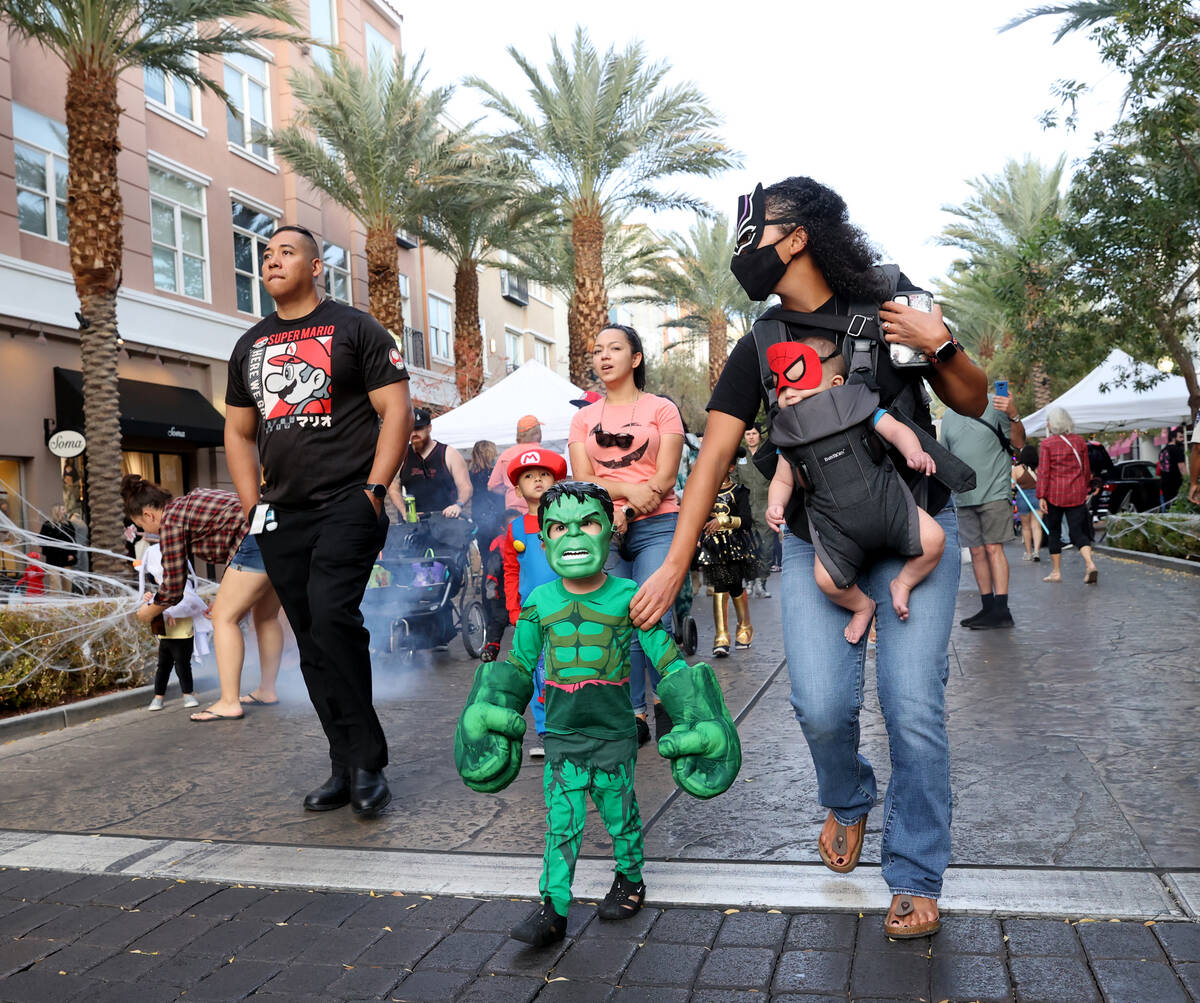 Natalie with her children Zane, 3, and Asher, 7 months, during the Halloween Ghost Walk at The ...