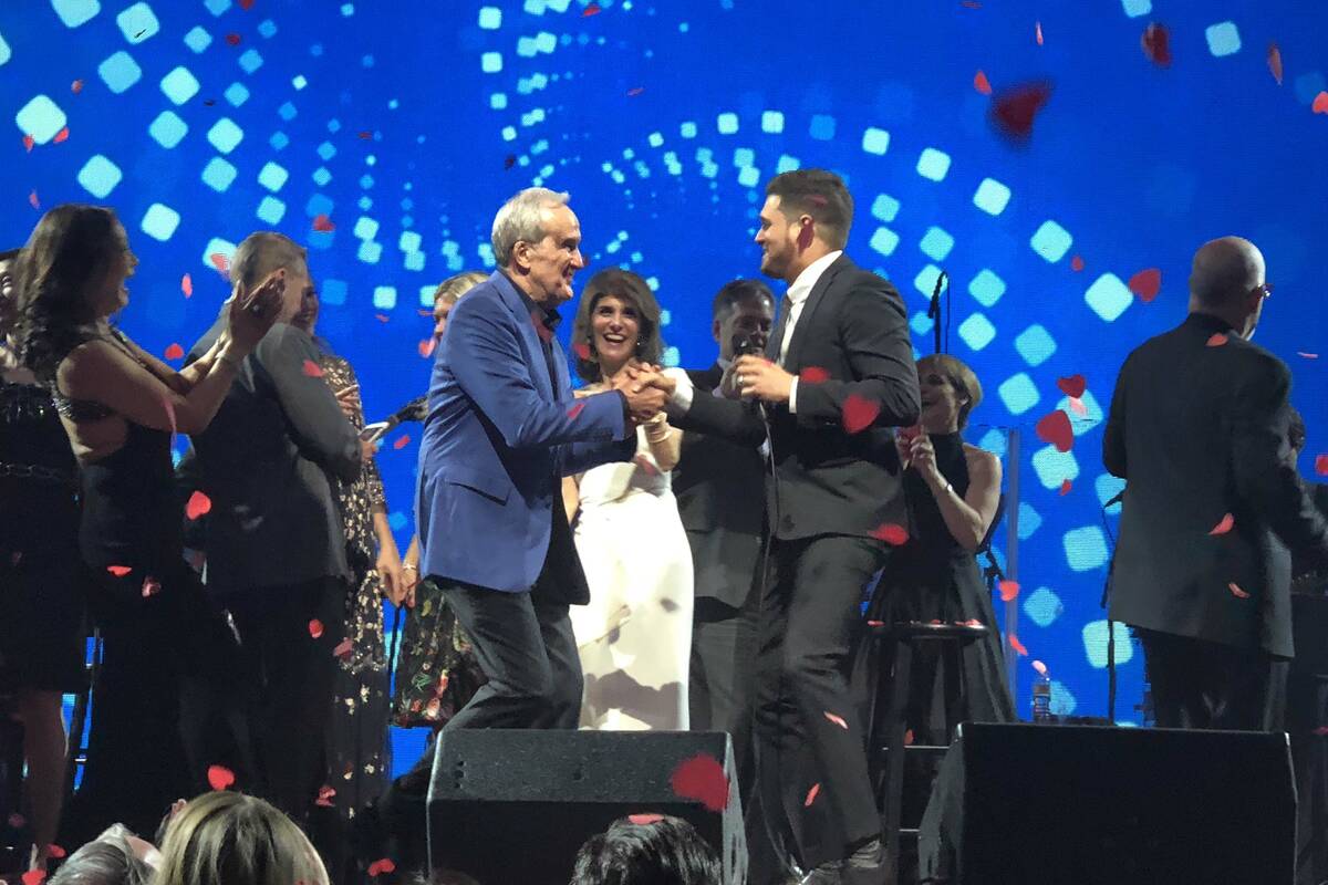 Michael Buble is show with Larry and Camille Ruvo at 22nd Keep Memory Alive Power of Love gala ...