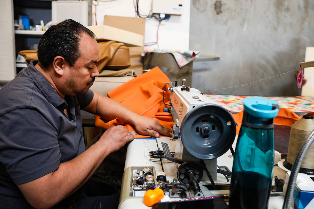 Jaime Molina sews a patio cushion at Summerlin Upholstery in Las Vegas, Monday, Nov. 1, 2021. S ...