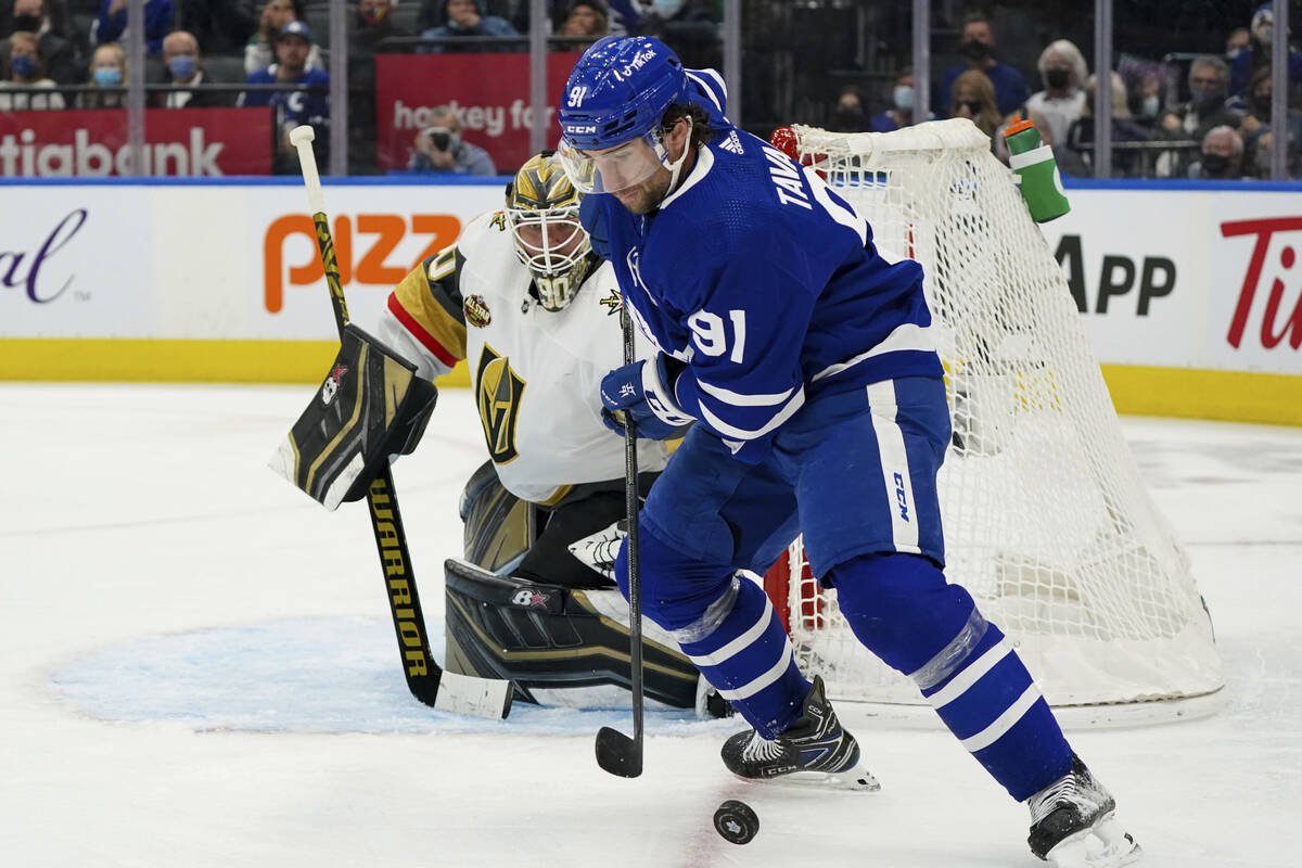 Toronto Maple Leafs forward John Tavares (91) controls the puck as Vegas Golden Knights goalten ...