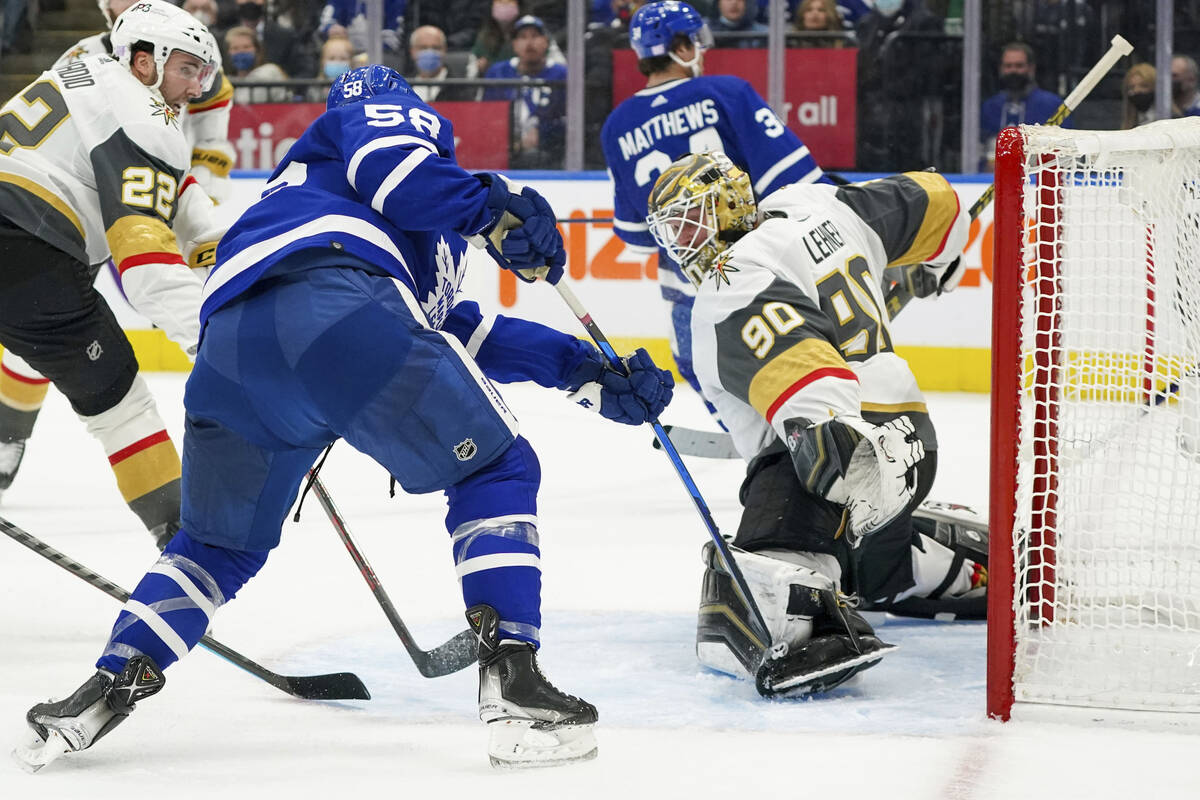 Vegas Golden Knights goaltender Robin Lehner (90) makes a pad save against Toronto Maple Leafs ...