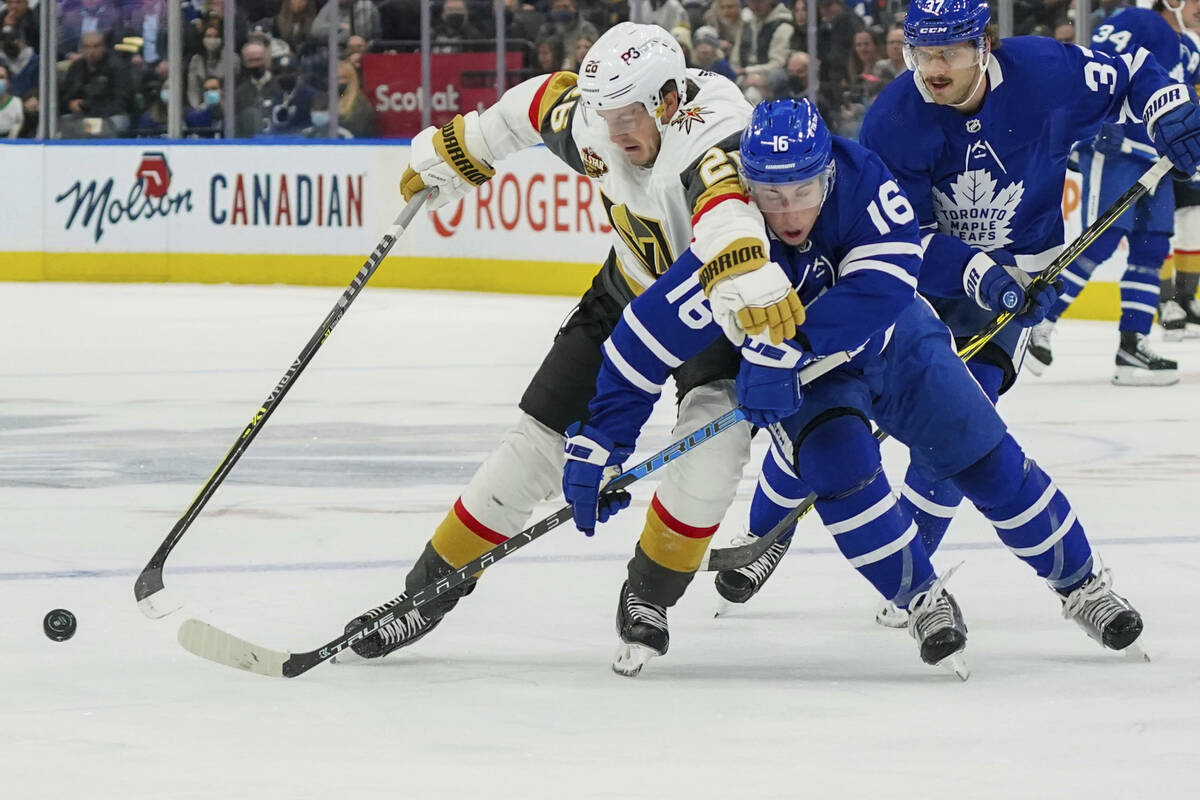 Vegas Golden Knights forward Mattias Janmark (26) and Toronto Maple Leafs forward Mitchell Marn ...