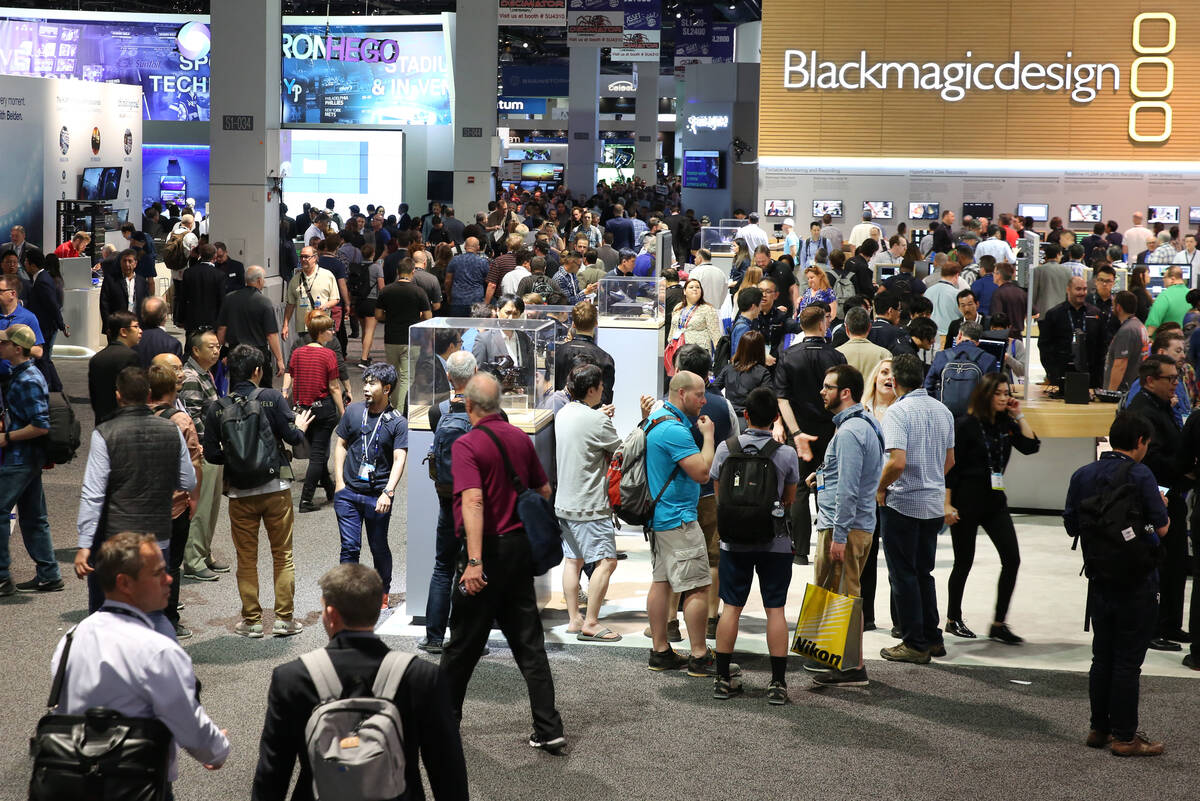 Showgoers arrive at the National Association of Broadcasters (NAB) show at the Las Vegas Conven ...