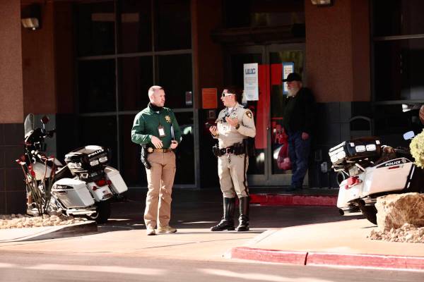 Las Vegas police officers are seen outside University Medical Center on Tuesday, Nov. 2, 2021, ...